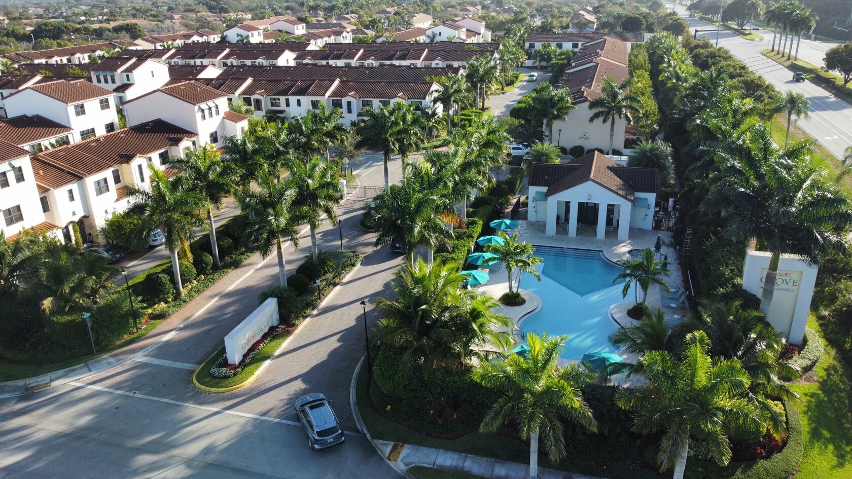 Clubhouse and pool amenity landscaping maintained by Top Green